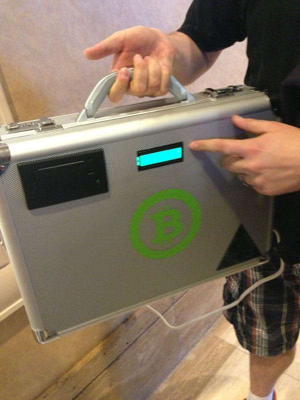 Bitcoin Briefcase Converts… hold on I have some more quarters here